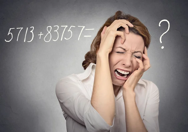 Stressed woman can't solve math problem — Stock Photo, Image