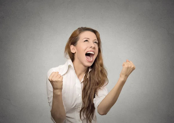 Happy woman exults pumping fists celebrates success — Stock Photo, Image