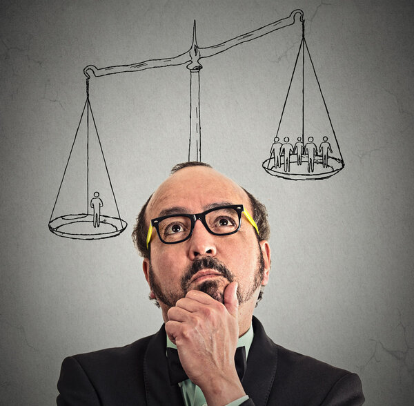 businessman with scale above head