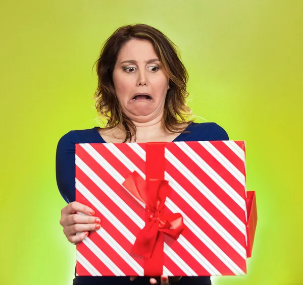 Woman opening gift box upset at what she received — Stock Photo, Image