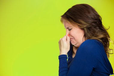 woman covers pinches her nose something stinks clipart