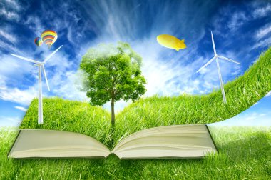 Yeşil mikro dünya, kitap yüklü yeşil çim Rüzgar enerjisi türbinleri ile kaplı