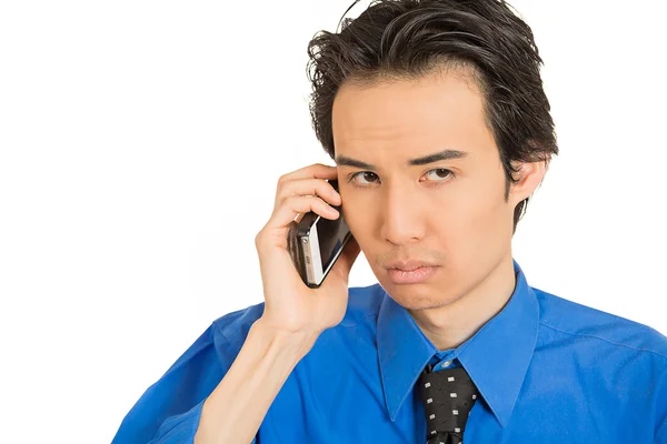 Headshot upset depressed worried young man talking on mobile phone — Stock Photo, Image