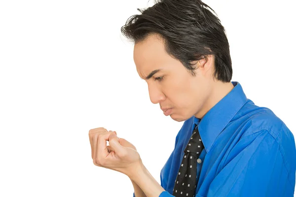 OCD man looking at hands nails obsessing about cleanliness germs — Stock Photo, Image