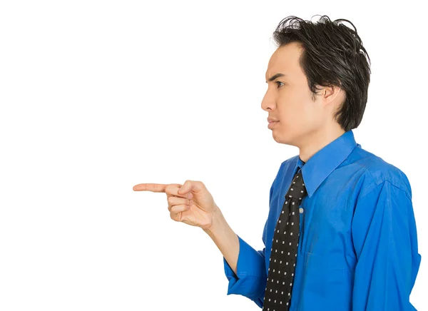 Serious man, pointing with index finger at someone — Stock Photo, Image