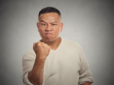 angry middle aged man fist up clipart