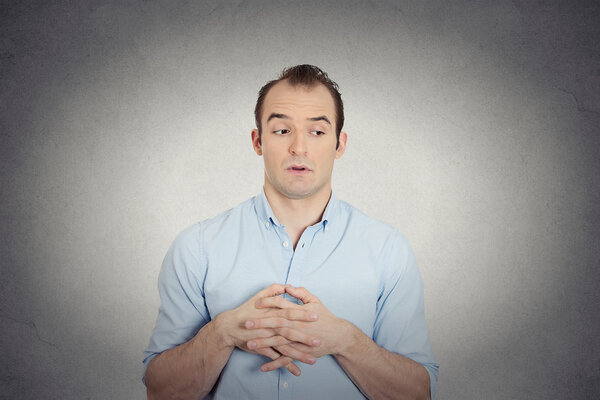 envious, guilty, sly young business man