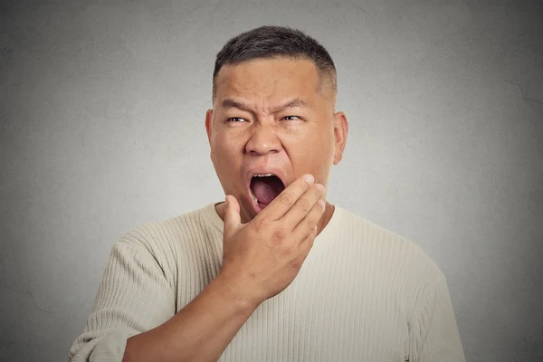 Headshot sleepy middle aged business man yawning — Stock Photo, Image