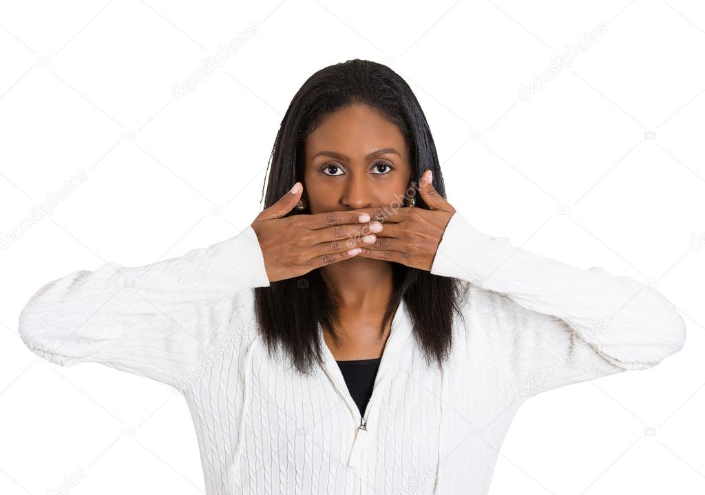 middle aged woman covering closed mouth