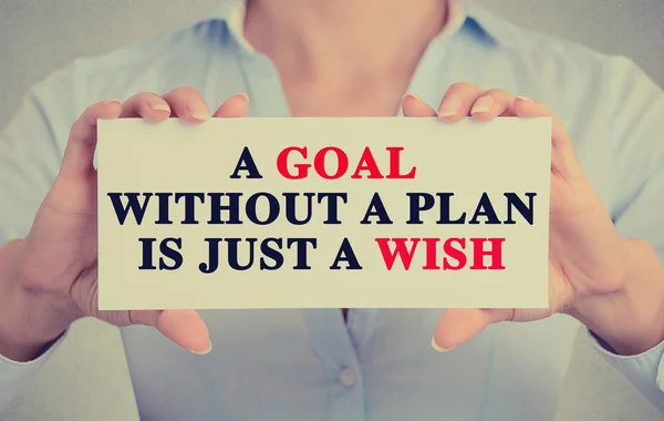 Woman hands holding sign with a goal without plan is just wish message — Stock Photo, Image