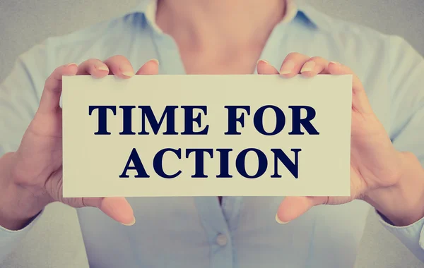Businesswoman hands holding card sign with time for action message — Stock Photo, Image