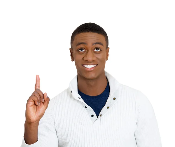Man pointing up looking at something above showing with index finger — Stock Photo, Image