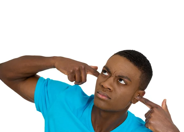 Unhappy stressed man covering his ears looking up — Stock Photo, Image