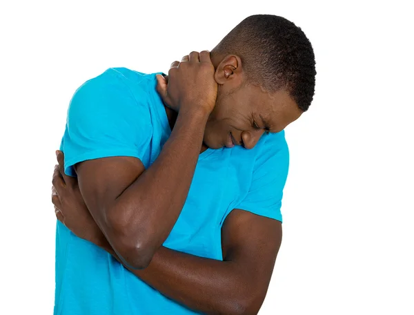 Stressed, unhappy young handsome man with bad neck pain — Stock Photo, Image