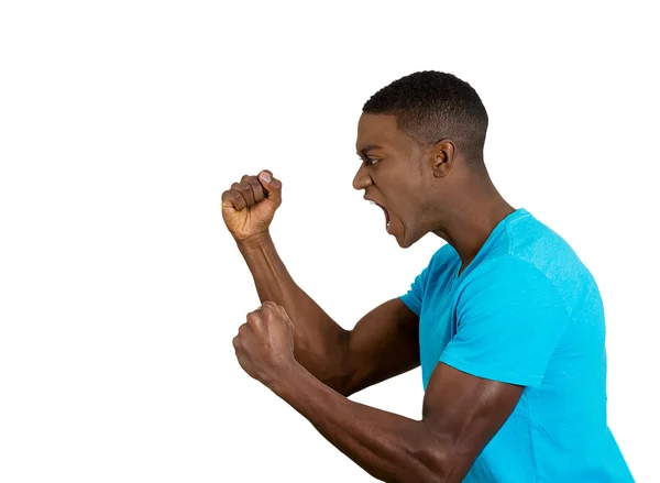 Angry upset young man, employee, fists in air, open mouth yelling — Stock Photo, Image