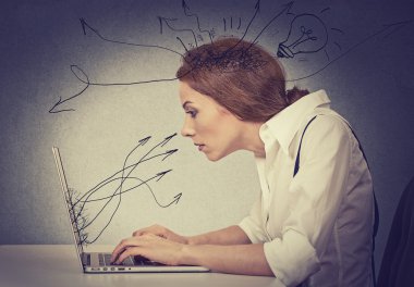 Business woman working on computer  clipart