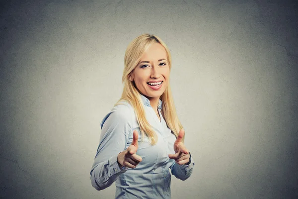 Happy woman with two thumbs up guns hand gesture pointing at you — Stock Photo, Image