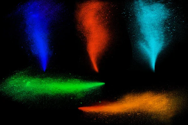 Freeze motion of colorful powder paint exploding — Stock Photo, Image