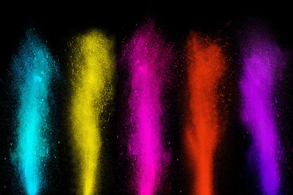 Freeze motion of colorful powder paint exploding streaming up — Stock Photo, Image