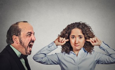 Angry mature man screaming at his young wife woman  clipart