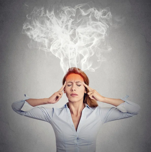 Woman thinking too hard steam coming out up of head — Stock Photo, Image