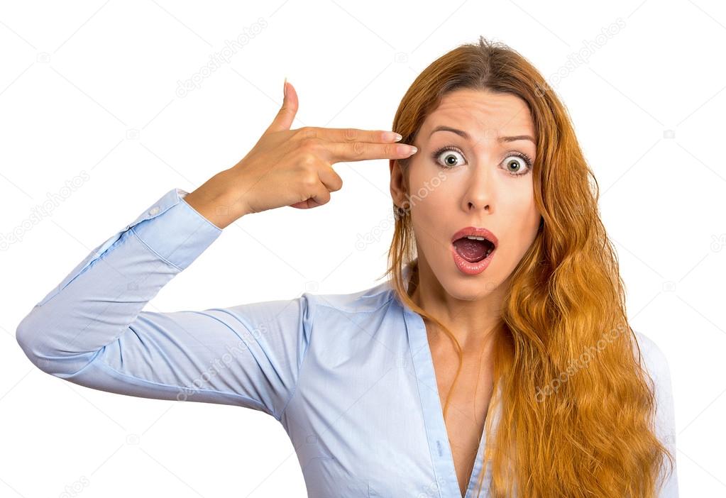 stressed young woman with hand finger gun gesture