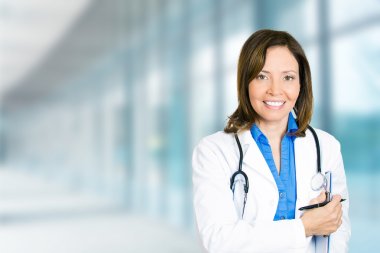 confident female doctor medical professional in hospital 