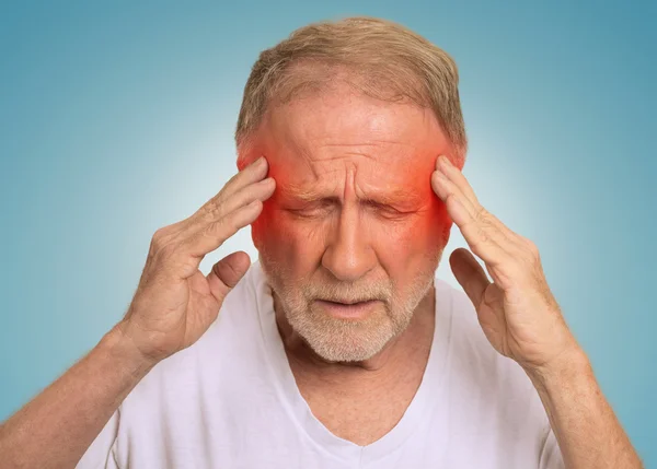 Senior man suffering from headache hands on head — Stock Photo, Image