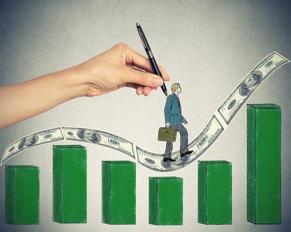 Businessman climbing up on money dollar bills hill growing chart — Stock Photo, Image