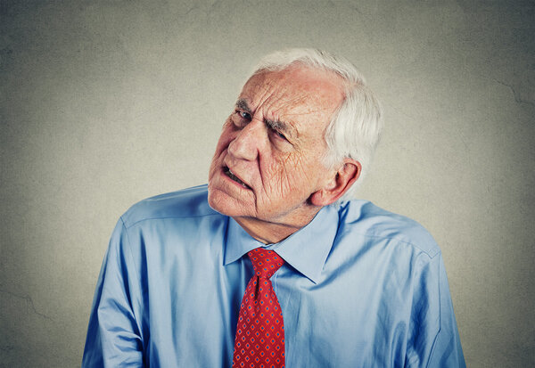 senior man hard of hearing asking to speak up can't hear 