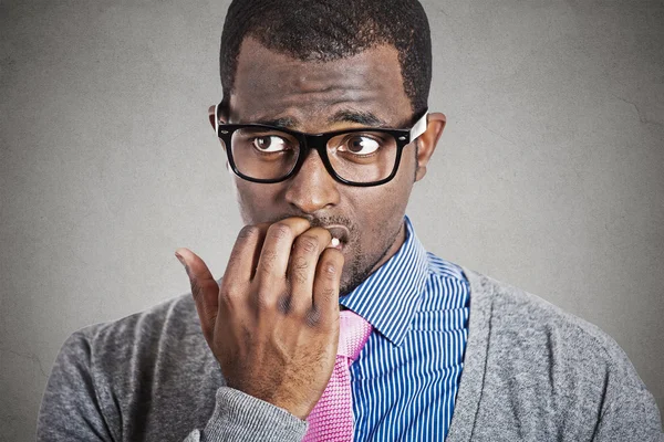 Anxious young business man looking away — Stock Photo, Image