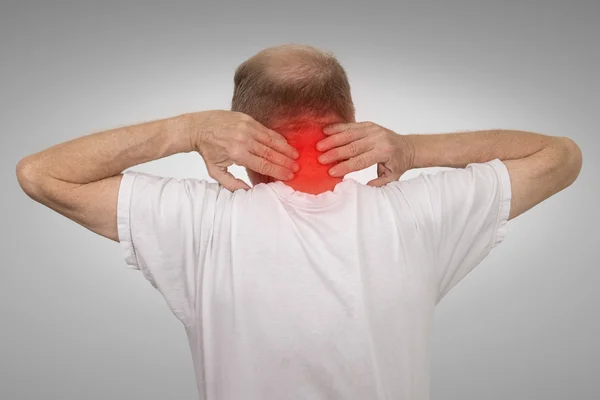 Old man with neck spasm pain touching red inflamed area — Stock Photo, Image