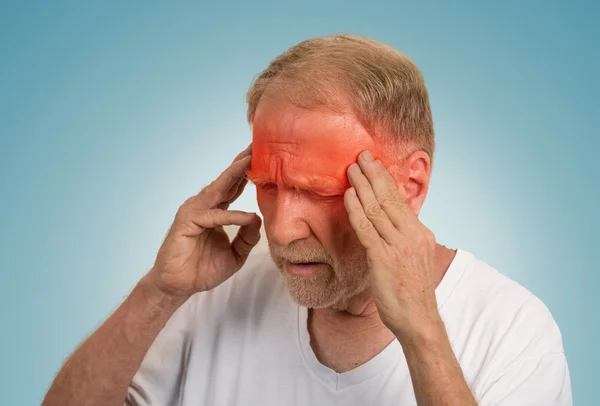 Senior man suffering from headache — Stock Photo, Image