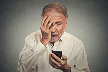 stressed man holding cellphone shocked with message received clipart
