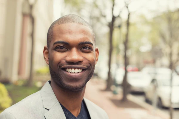 Headshot portrait of young man smiling — Stock Photo, Image