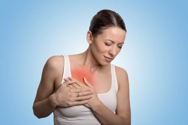 Young woman with chest breast pain colored in red — Stockfoto