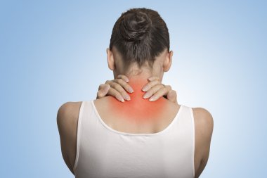 Back spine disease. Closeup view tired female massaging her neck clipart