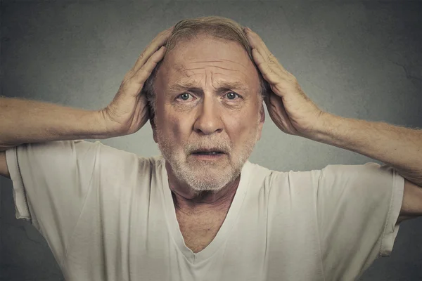 Shocked sad senior man — Stockfoto