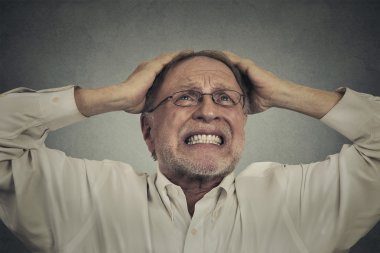 furious frustrated elderly man having hard day 