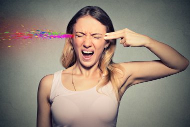 woman committing suicide with finger gun gesture, explosion of colors