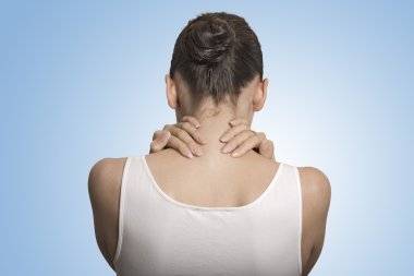 back view tired female massaging her painful neck clipart