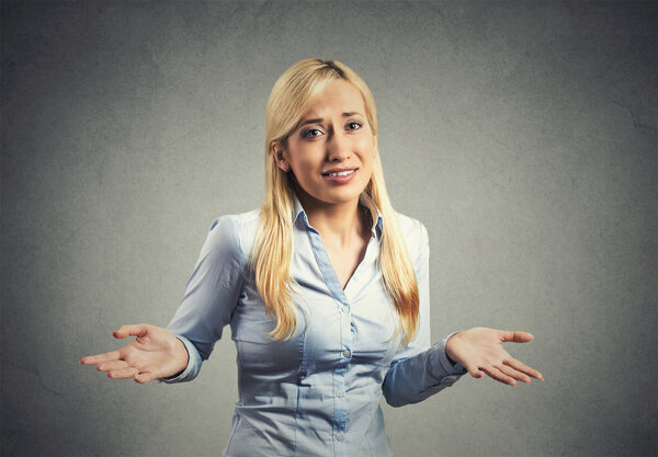 woman arms out shrugs shoulders 