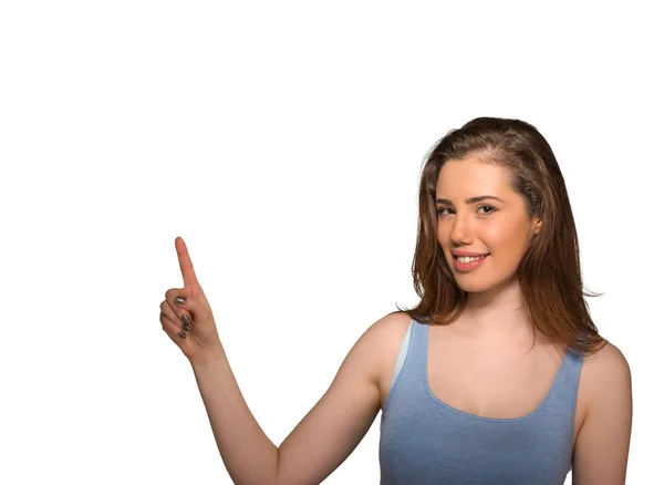 Beautiful woman pointing with finger up to side at empty copy space — Stock Photo, Image