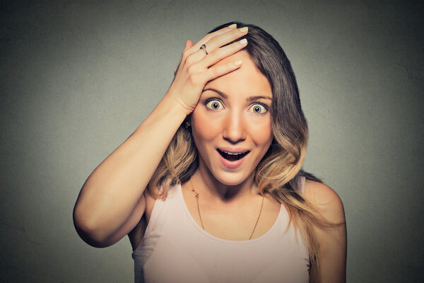 Surprise astonished woman in full disbelief wide open mouth