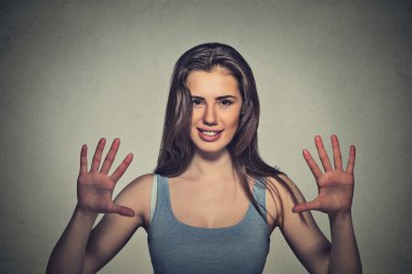 smiling woman making five times sign gesture with hands fingers