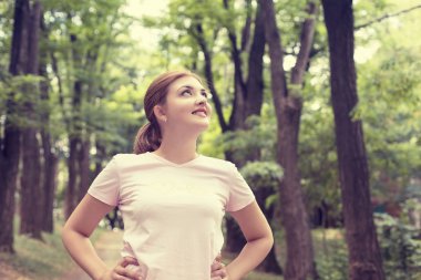 fit woman resting after workout sport exercises outdoor