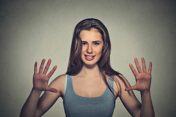 Smiling woman making five times sign gesture with hands fingers — ストック写真