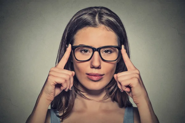 Attractive young optician woman with brown eyes in glasses — Zdjęcie stockowe