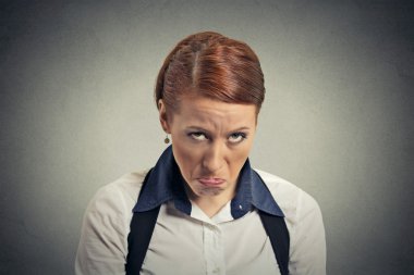 Sad grumpy young woman