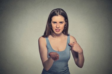 woman gesturing with hand palms up to pay back now bills money